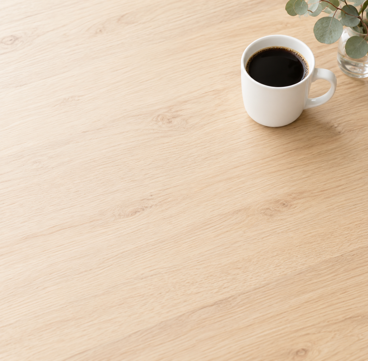 A pale oak executive desk